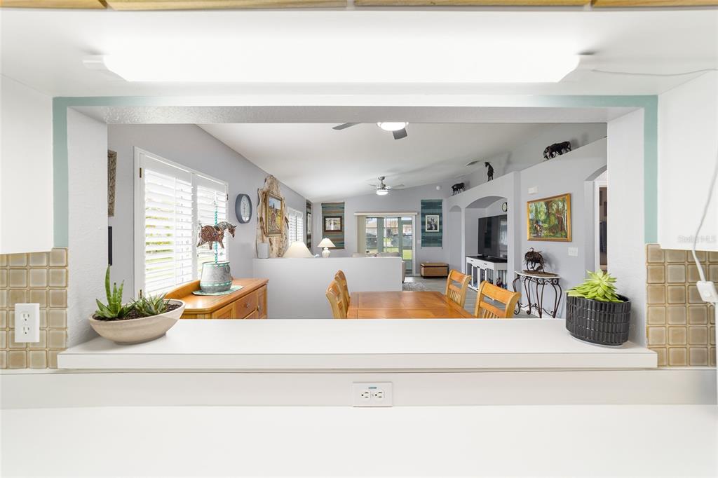 8608 Southeast 141st Street Road Summerfield, FL 34491 - Photo 24 of 82 a view of living room with furniture and a potted plant