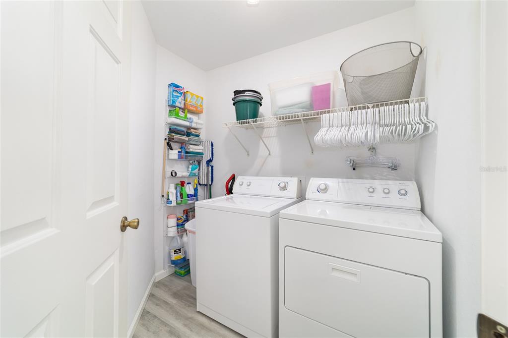 8608 Southeast 141st Street Road Summerfield, FL 34491 - Photo 37 of 82 a utility room with dryer and washer