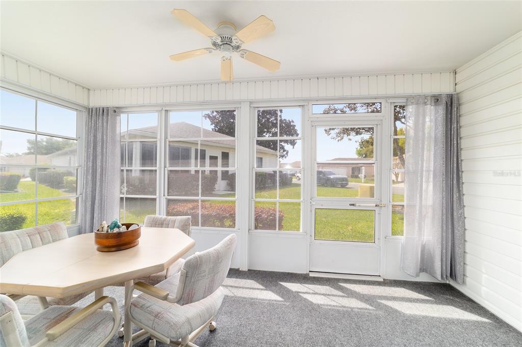 8608 Southeast 141st Street Road Summerfield, FL 34491 - Photo 40 of 82 a workspace with furniture window and outside view