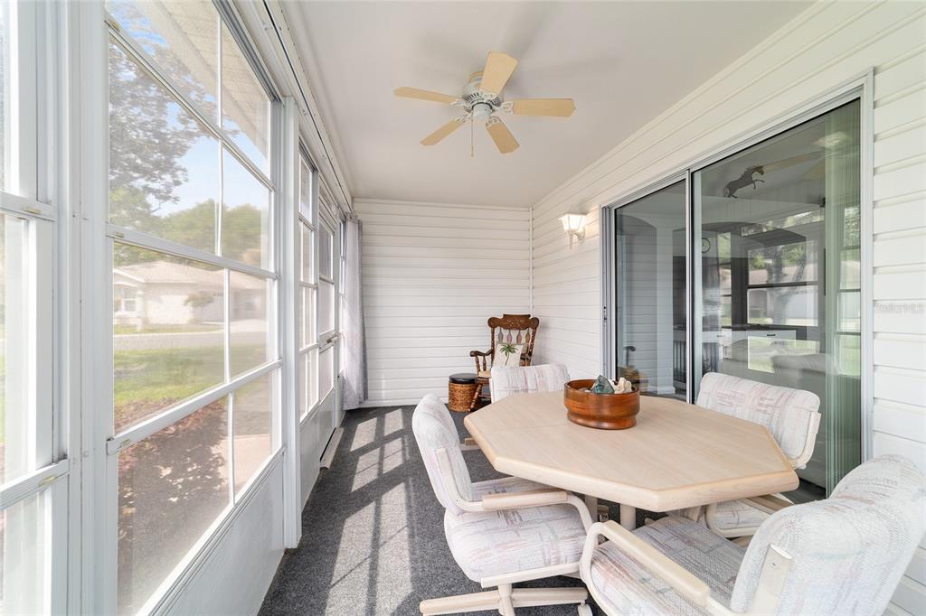 8608 Southeast 141st Street Road Summerfield, FL 34491 - Photo 42 of 82 a view of a dining room with furniture window and outside view