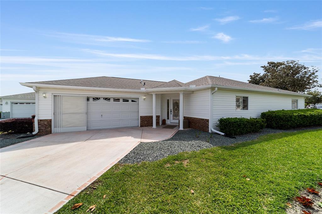 8608 Southeast 141st Street Road Summerfield, FL 34491 - Photo 48 of 82 a view of house with outdoor space and swimming pool