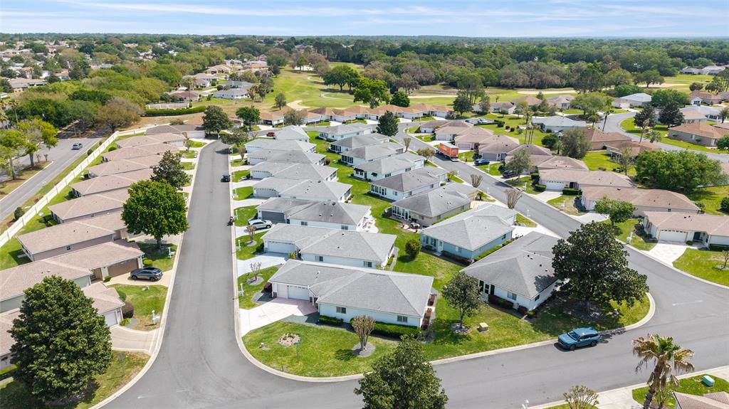 8608 Southeast 141st Street Road Summerfield, FL 34491 - Photo 55 of 82 an aerial view of residential houses with outdoor space and street view