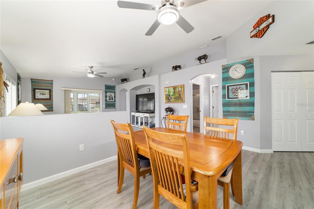 8608 Southeast 141st Street Road Summerfield, FL 34491 - Photo 8 of 82 a dining room with furniture and window