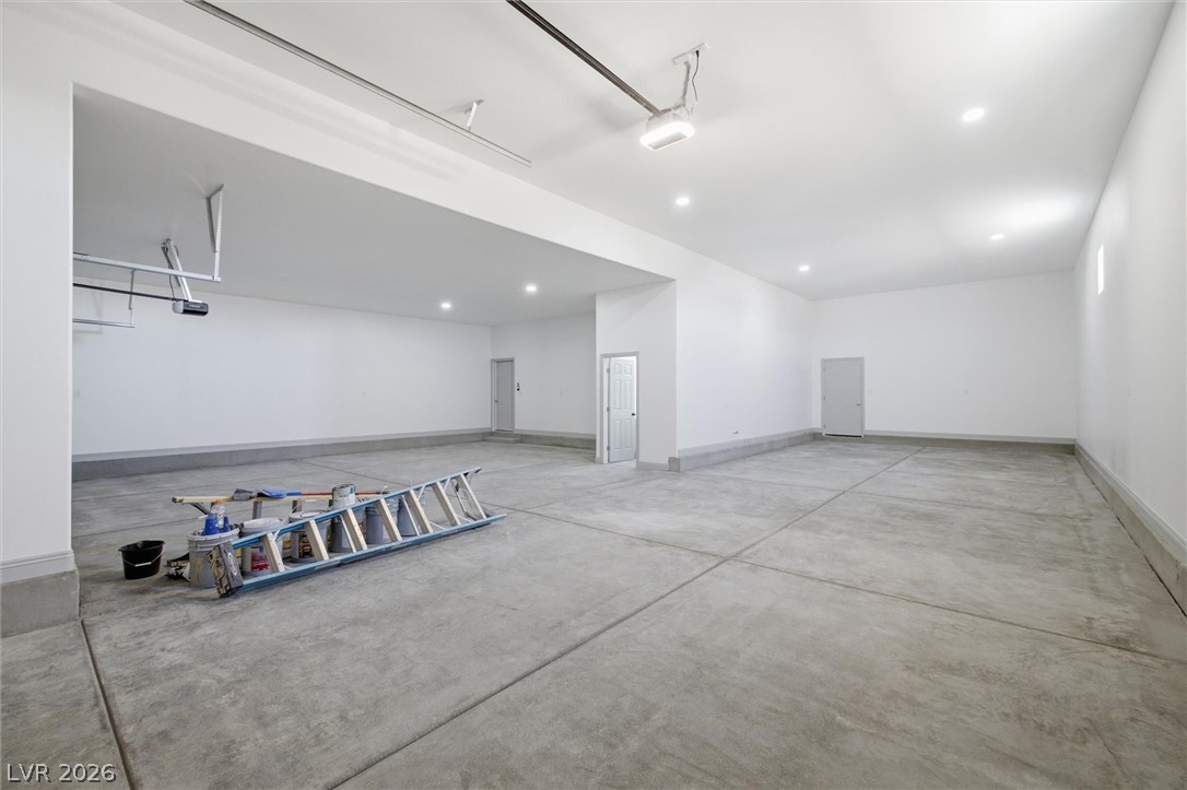 1061 Factory Road Pahrump, NV 89048 - Photo 32 of 41 Ample space for multiple vehicles, this oversized garage offers practical utility.