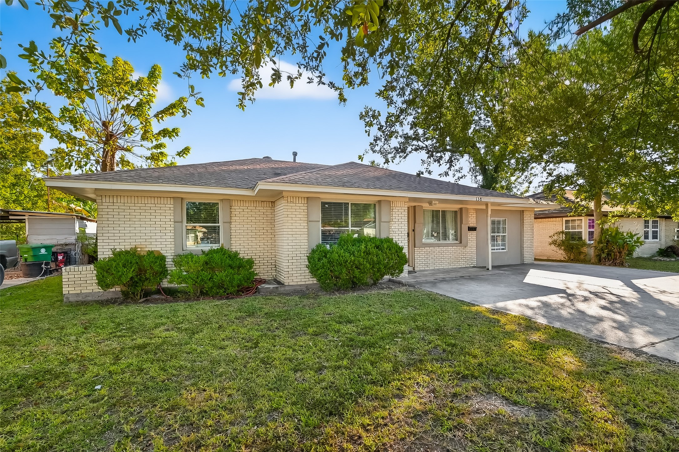 138 East Rocky Creek Road Houston, TX 77076 - Photo 13 of 13 a view of a house with a yard