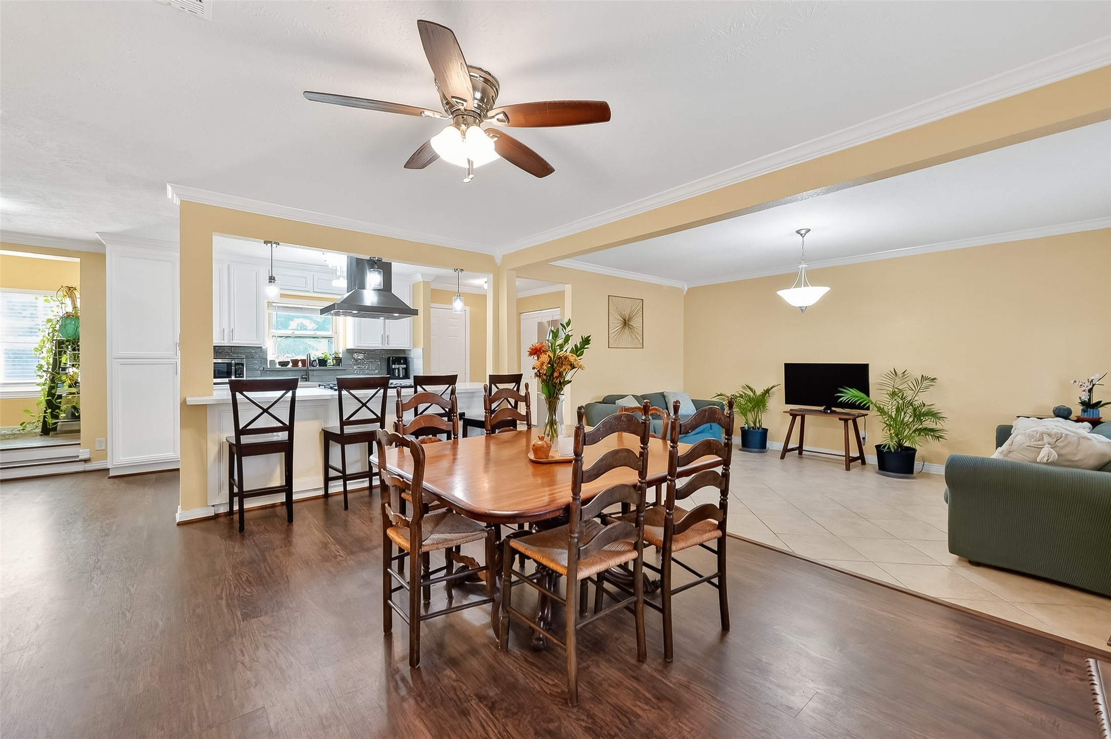 138 East Rocky Creek Road Houston, TX 77076 - Photo 2 of 13 a view of a dining room with furniture window and wooden floor