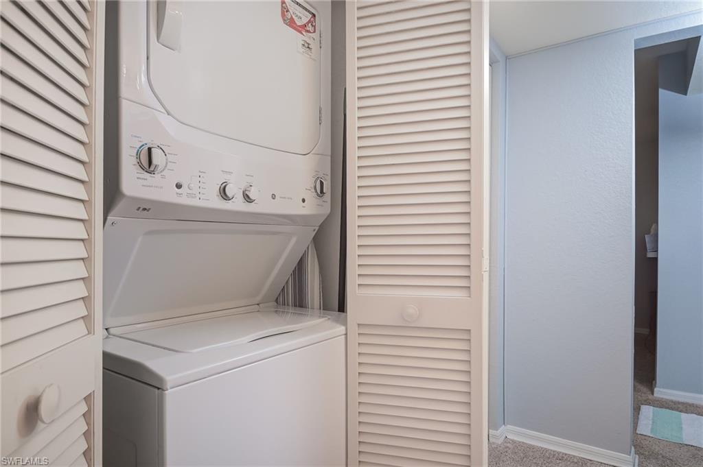 4121 Lorene Drive, Unit 207 Estero, FL 33928 - Photo 20 of 34 a utility room with dryer and washer