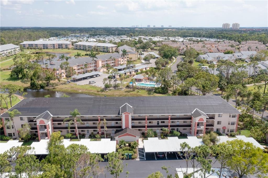 4121 Lorene Drive, Unit 207 Estero, FL 33928 - Photo 2 of 34 an aerial view of a house with a lake view