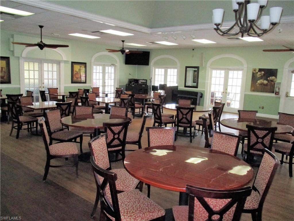 4121 Lorene Drive, Unit 207 Estero, FL 33928 - Photo 29 of 34 a view of a dining room with furniture