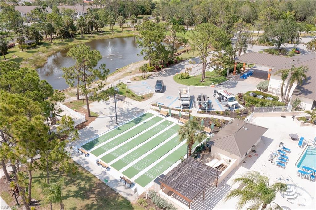 4121 Lorene Drive, Unit 207 Estero, FL 33928 - Photo 30 of 34 an aerial view of a house with a lake view