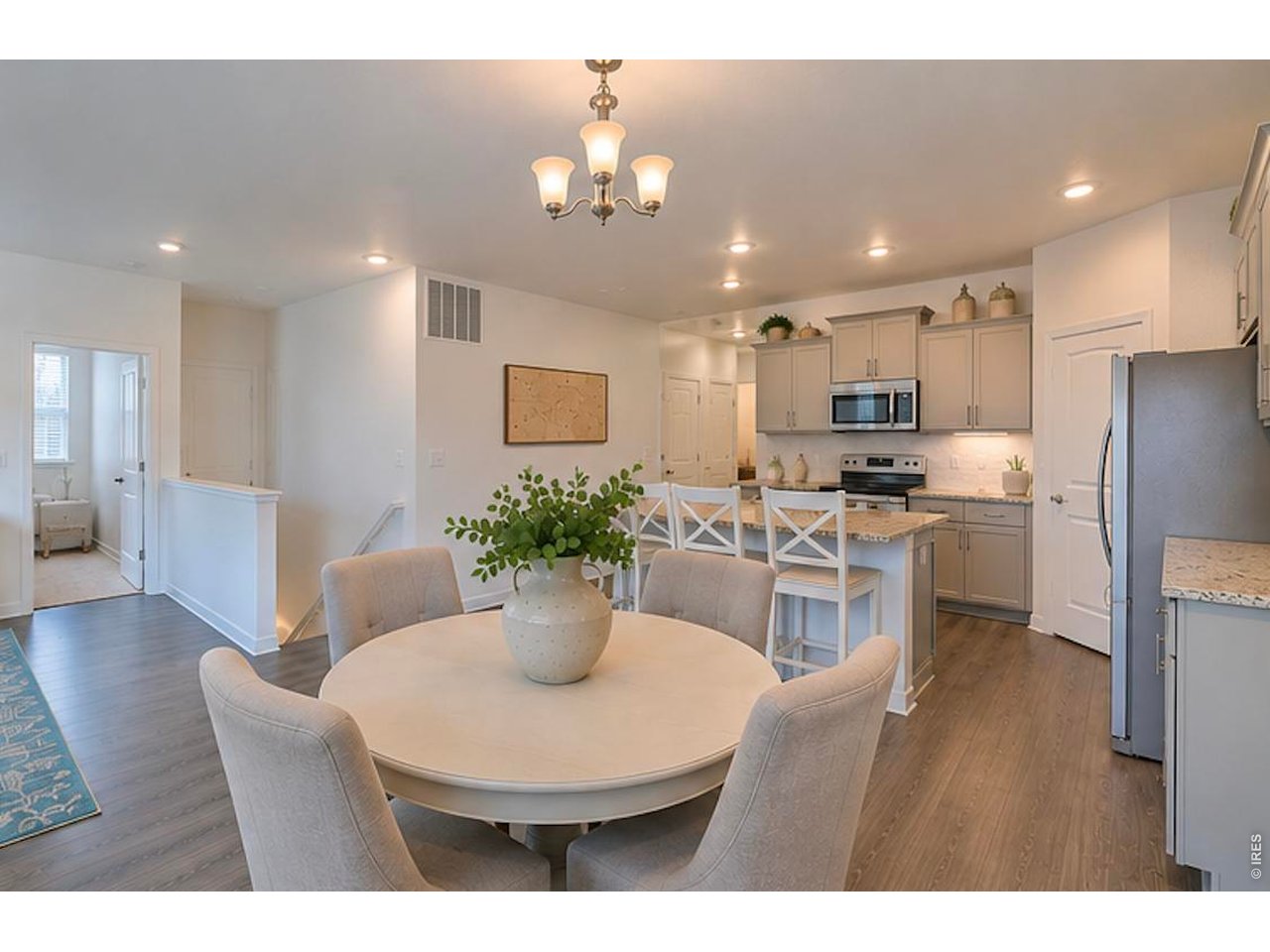 1269 Wild Basin Road Severance, CO 80550 - Photo 14 of 45 Kitchen and dining area-photo virtually enhanced