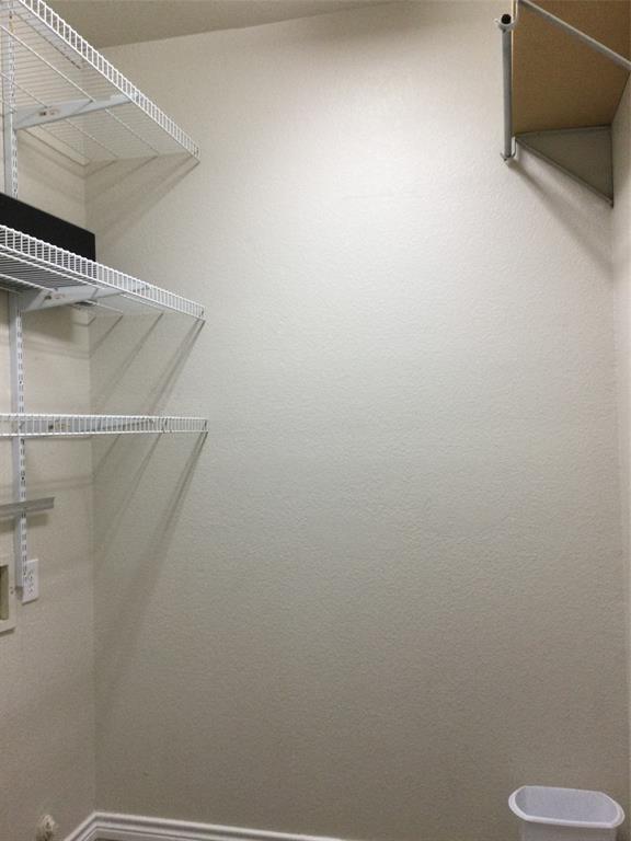 9814 Glenshee Drive Rowlett, TX 75089 - Photo 21 of 25 View of walk in closet