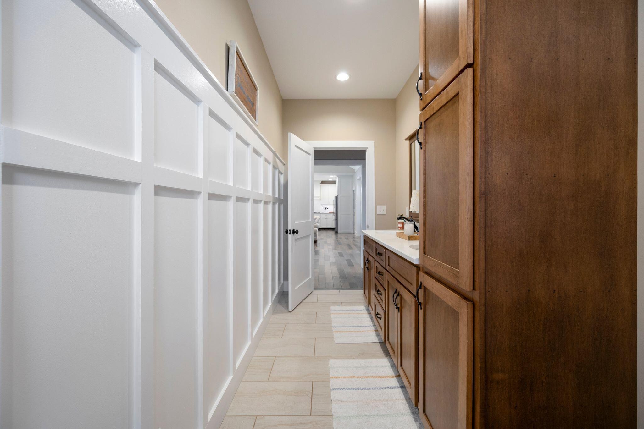 6866 Daus Mountain Road Whitwell, TN 37397 - Photo 22 of 49 a view of a hallway with wooden floor and staircase