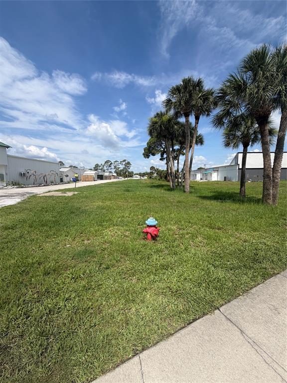0 South Ridgewood Avenue Edgewater, FL 32141 - Photo 2 of 4 a view of a golf course with a garden
