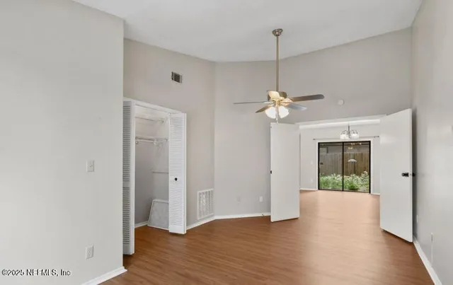a view of storage and utility room with washer and dryer