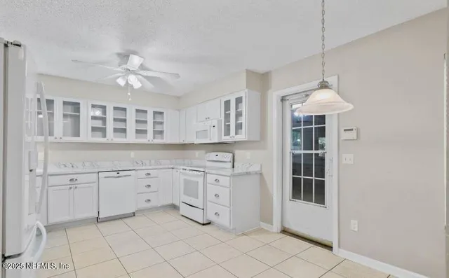 a view of empty room with windows