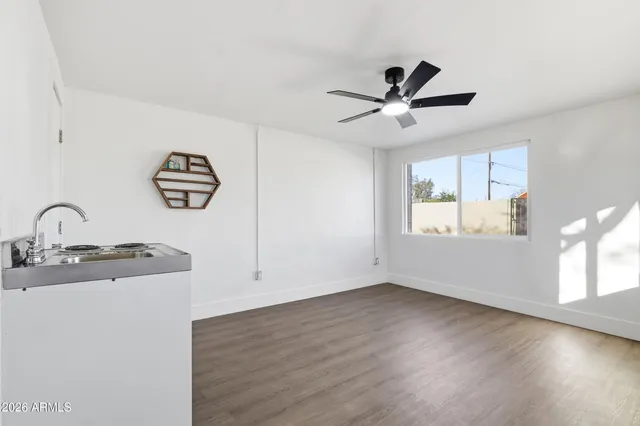 a view of cabinets and wooden floor