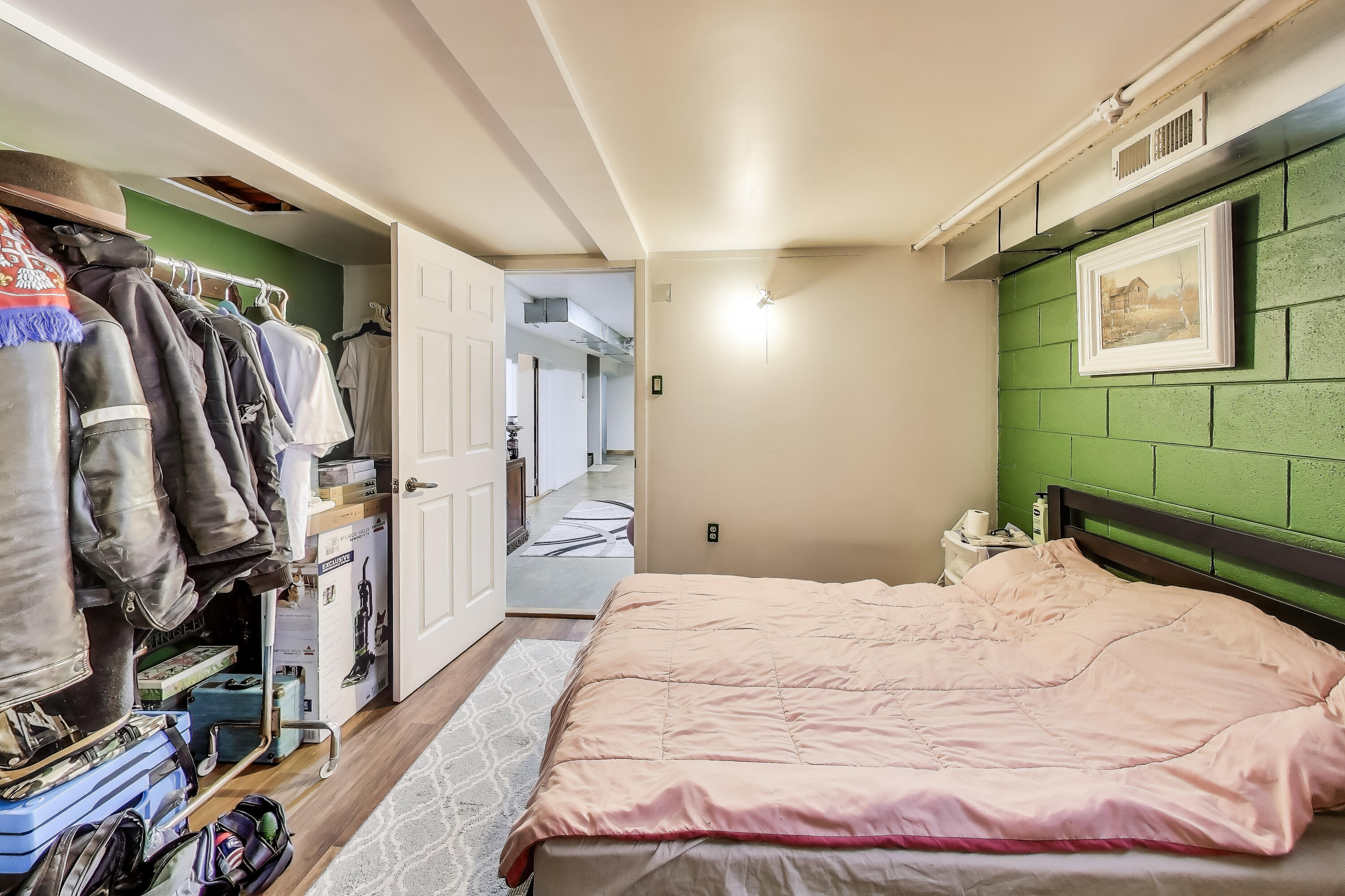 2036 Atchison Avenue Whiting, IN 46394 - Photo 22 of 30 a bedroom with a bed and a walk in closet