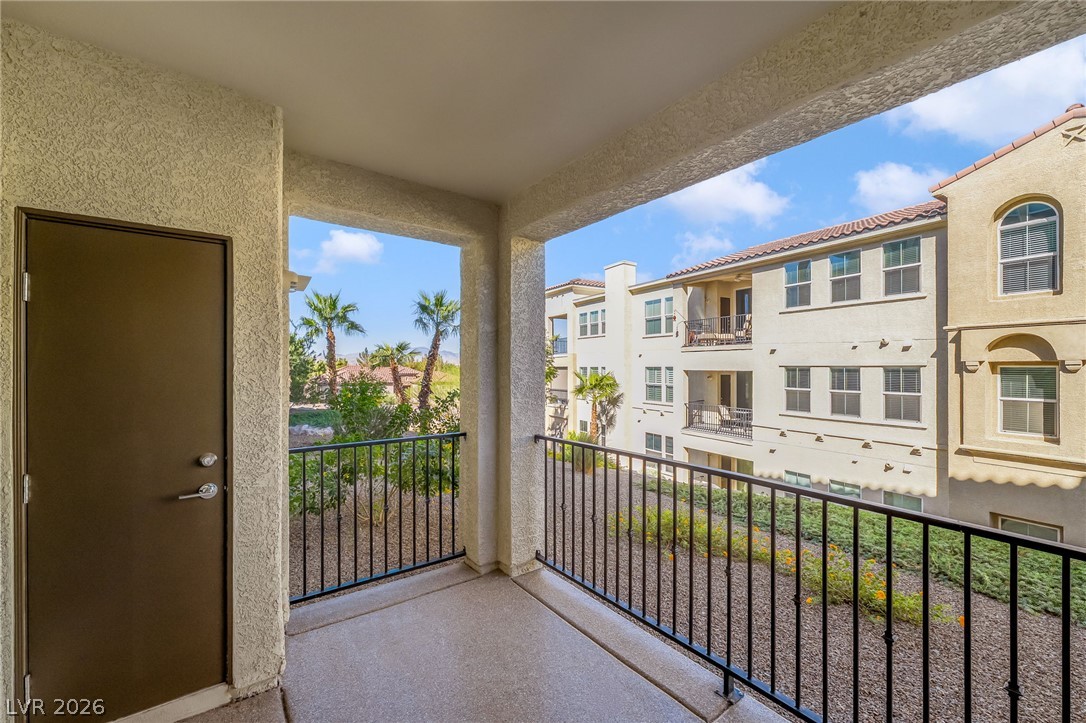 2555 Hampton Road, Unit 10108 Henderson, NV 89052 - Photo 20 of 23 A private covered balcony overlooks the surrounding neighborhood landscaping.