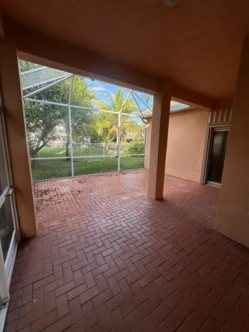 a view of porch with a floor to ceiling window