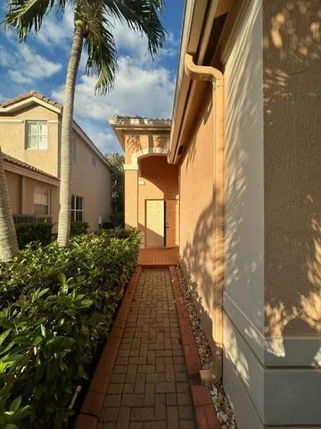 a view of path along with potted plants