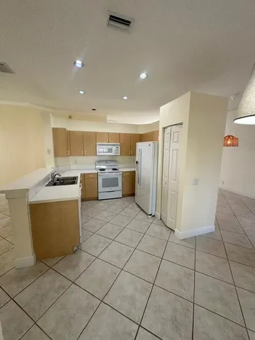 a kitchen with a cabinets and counter space