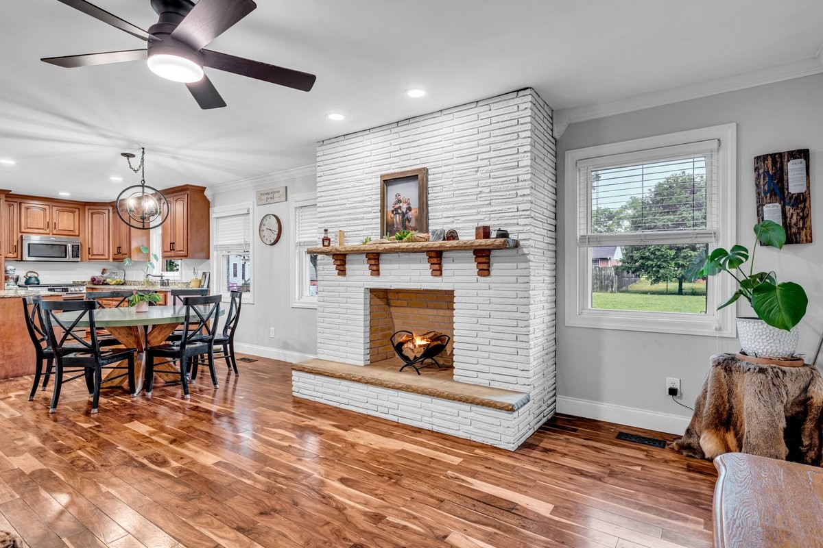 207 East Fort Street Tullahoma, TN 37388 - Photo 18 of 45 a living room with furniture and a fireplace