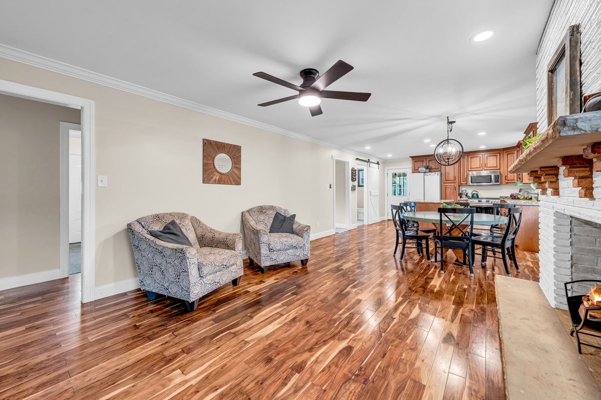 207 East Fort Street Tullahoma, TN 37388 - Photo 20 of 45 a living room with furniture and a wooden floor