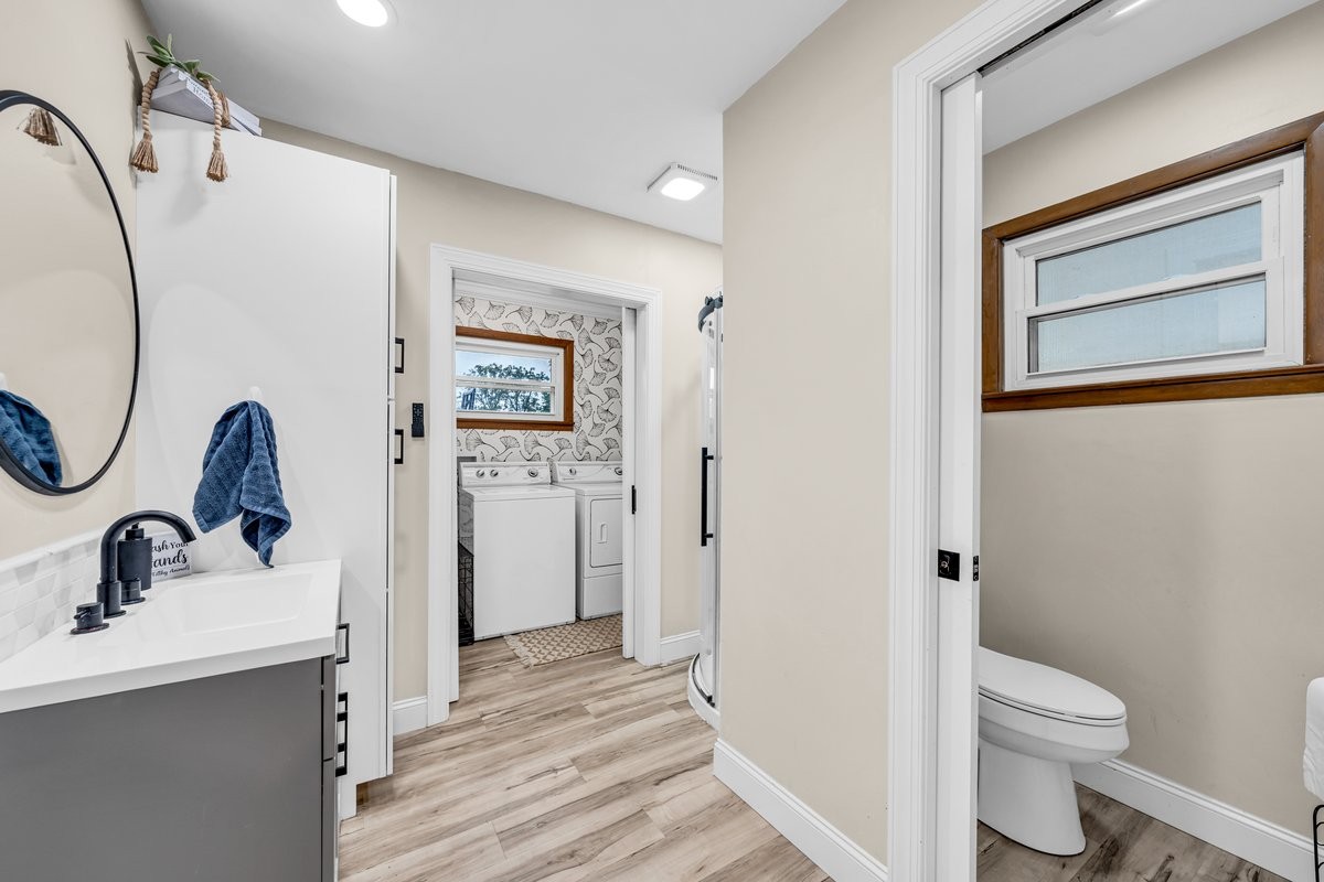 207 East Fort Street Tullahoma, TN 37388 - Photo 22 of 45 a bathroom with a sink and mirror with toilet