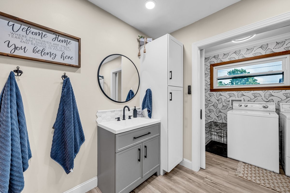 207 East Fort Street Tullahoma, TN 37388 - Photo 23 of 45 a bathroom with a sink a mirror and a shower