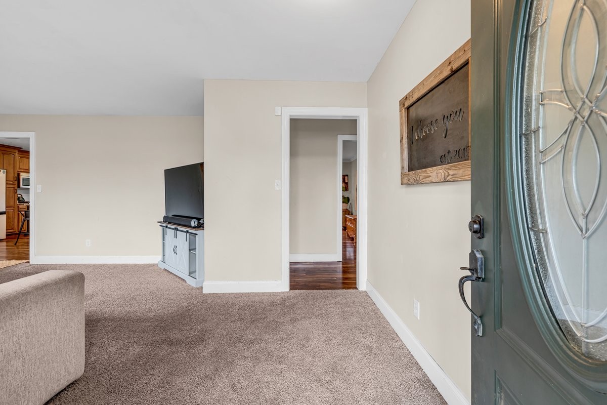 207 East Fort Street Tullahoma, TN 37388 - Photo 25 of 45 a view of a livingroom with a flat screen tv