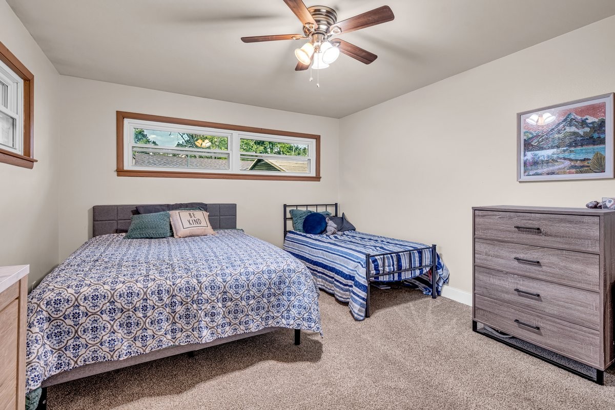 207 East Fort Street Tullahoma, TN 37388 - Photo 36 of 45 a bedroom with a bed and a dresser