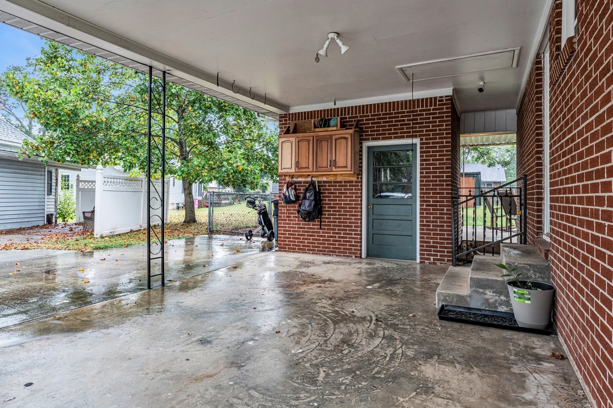 207 East Fort Street Tullahoma, TN 37388 - Photo 8 of 45 a view of a porch with furniture and a yard