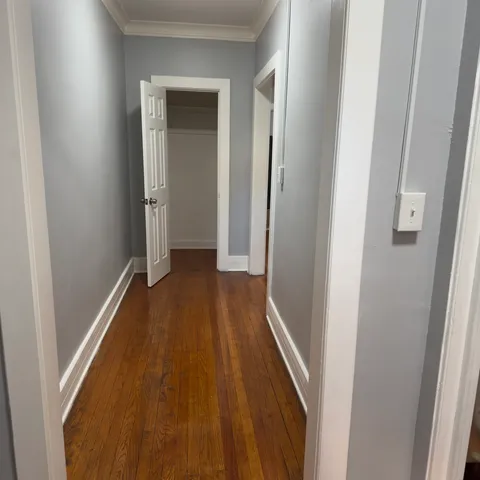 a kitchen with stainless steel appliances granite countertop a refrigerator and a stove