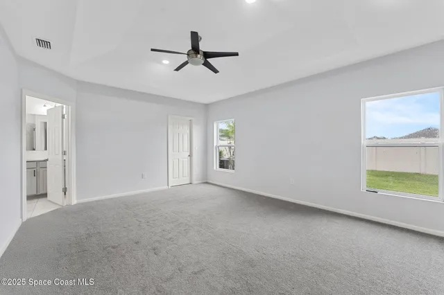 a bathroom with a sink double vanity and a mirror