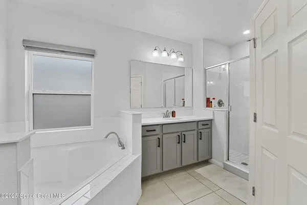 a view of a floor to ceiling window and a yard