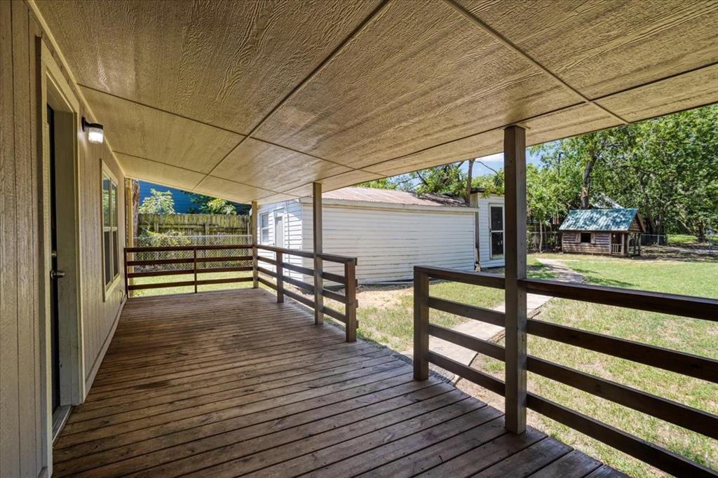 106 Cardinal Lane Pottsboro, TX 75076 - Photo 20 of 29 a view of a porch and wooden floor