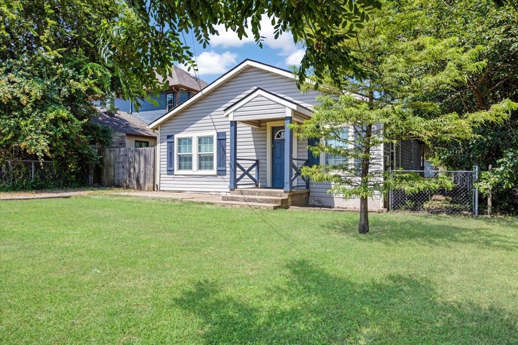 106 Cardinal Lane Pottsboro, TX 75076 - Photo 2 of 29 a front view of a house with a yard