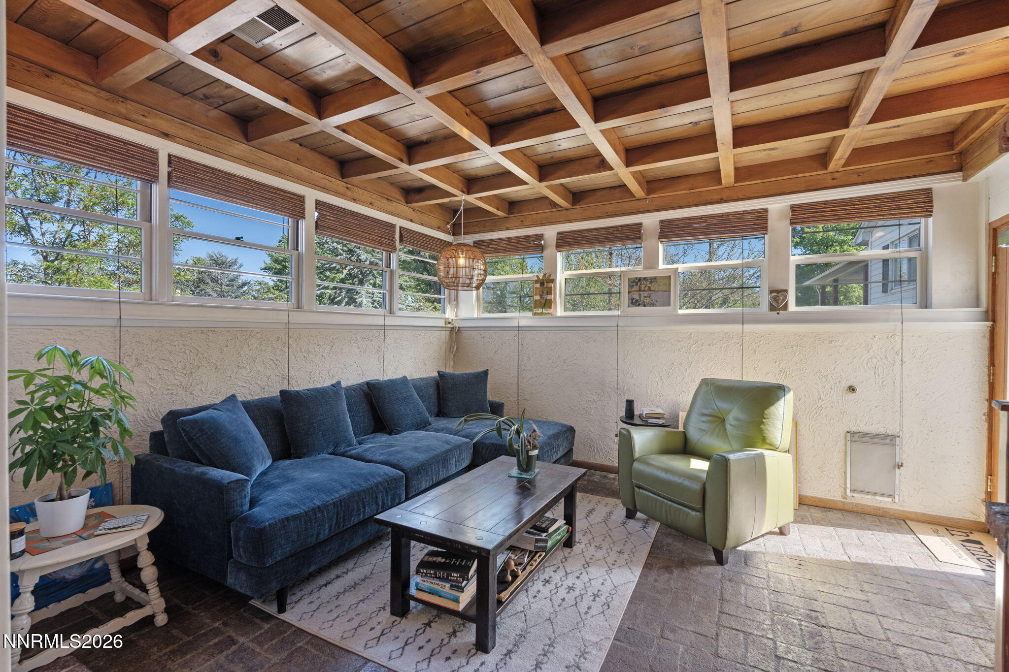 300 Country Club Drive Reno, NV 89509 - Photo 20 of 48 a outdoor living space with furniture and a potted plant