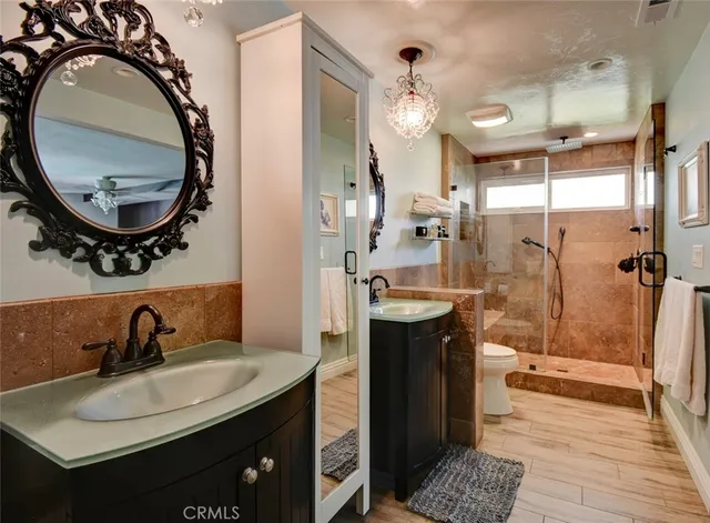 a bed room with a bed and dresser