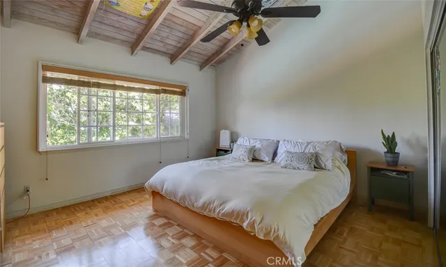 a bedroom with a bed and furniture