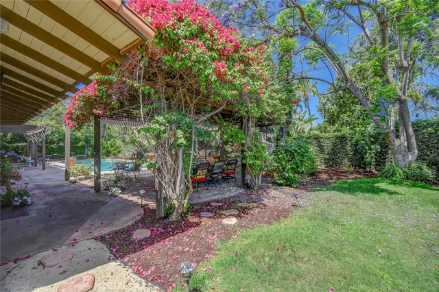 a view of a chairs and table in the patio