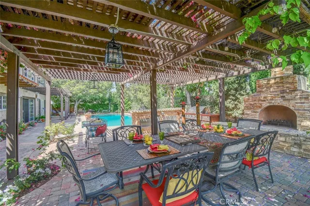 a view of a backyard with sitting area