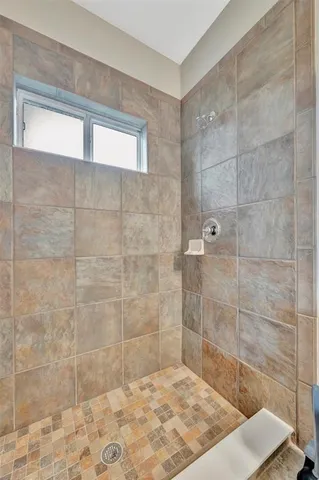 a front view of house with outdoor space and trees