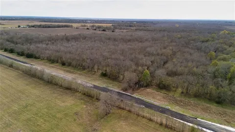 a view of a yard with an outdoor space