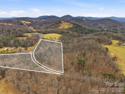 a view of a balcony with an outdoor space and lakeside