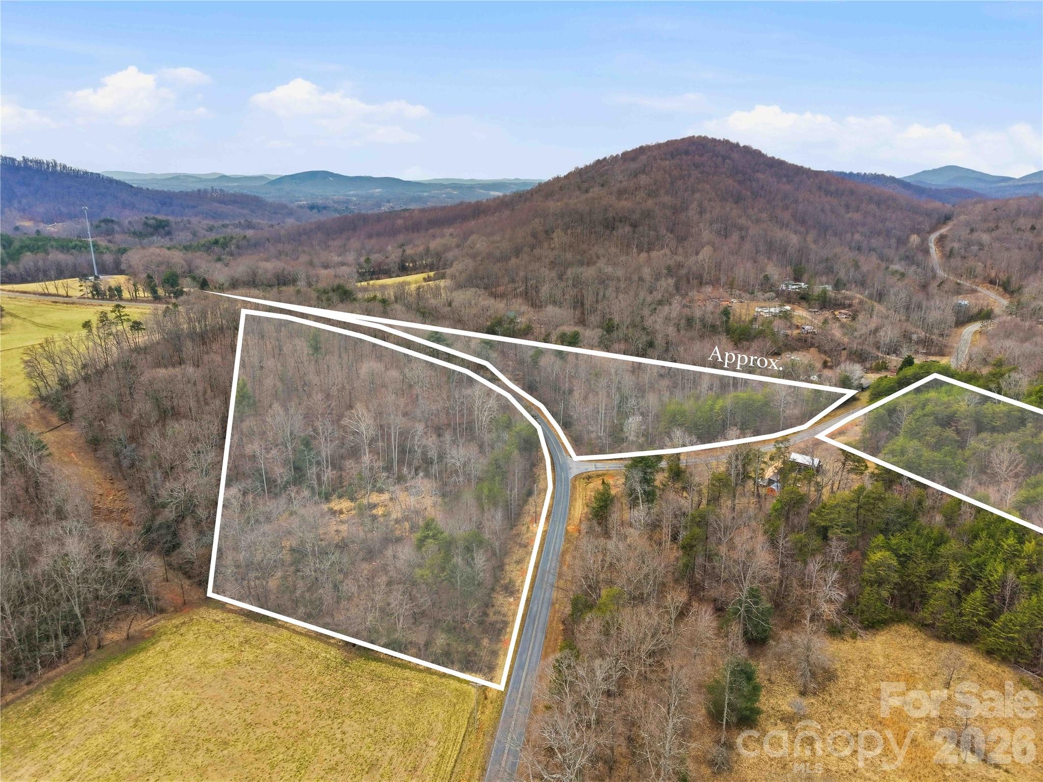 0 Pilgrim Church Road Hiddenite, NC 28636 - Photo 13 of 21 a view of a bathroom with a sink and mountains in the background
