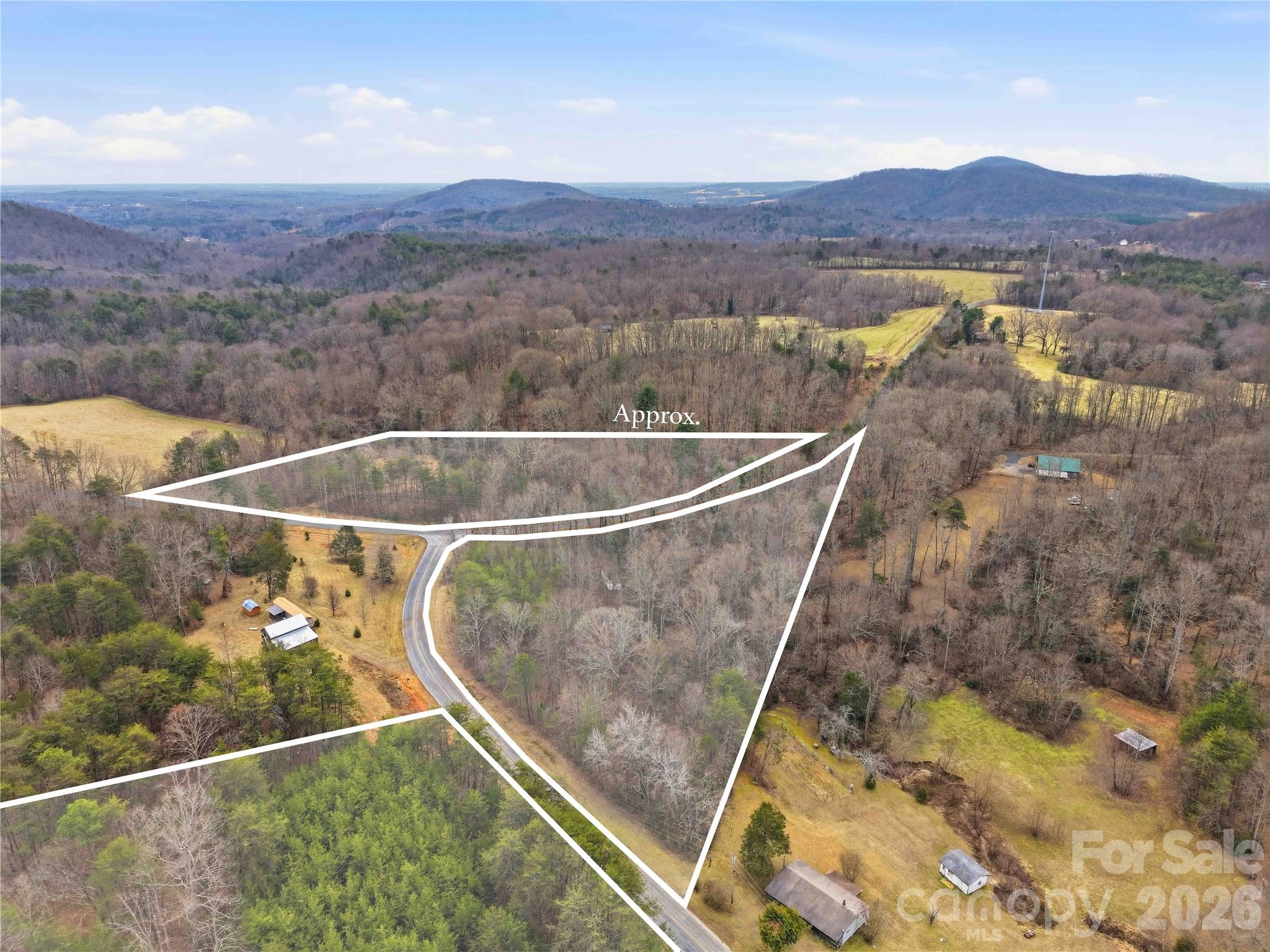 0 Pilgrim Church Road Hiddenite, NC 28636 - Photo 17 of 21 a view of a back yard from a balcony