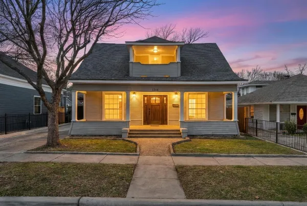 a view of house with yard