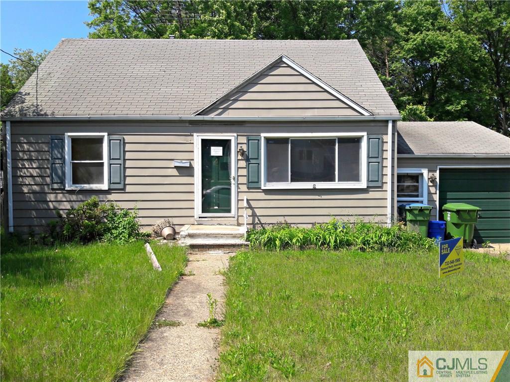 4 Sine Road Edison, NJ 08817 - Photo 1 of 25 a aerial view of a house with a yard